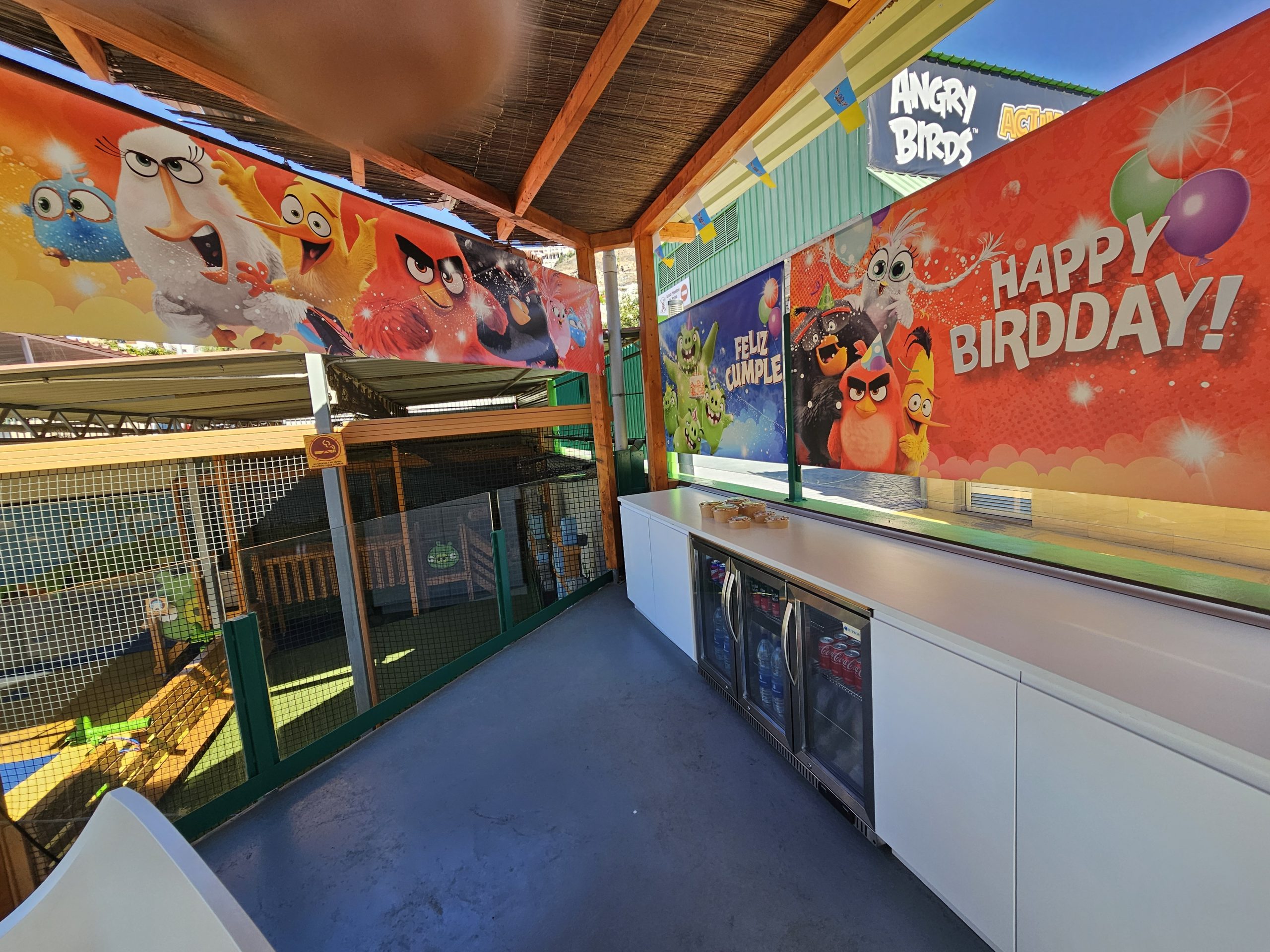 Angry Birds-themed party area with decorations and play zone.