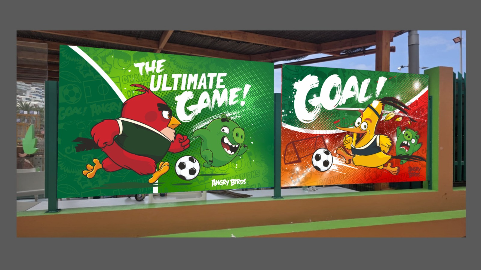 Angry Birds characters playing soccer on a vivid mural.